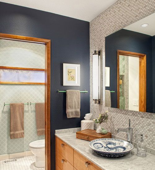 A bathroom with an accent wall